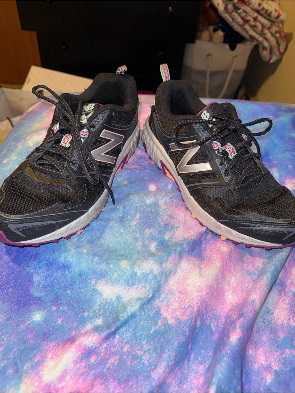New Balance Women's Black Athletic Sneakers with Pink and White Details